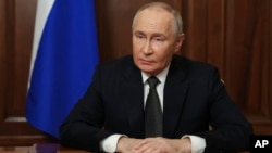 Russian President Vladimir Putin makes a video statement to the nation on November 21. 