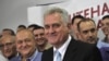 Serbian President-elect Tomislav Nikolic (foreground) celebrates his election victory with supporters in Belgrade.