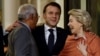 French President Emmanuel Macron (center) speaks with European Council President Antonio Costa and European Commission President Ursula von der Leyen in Paris on February 17.