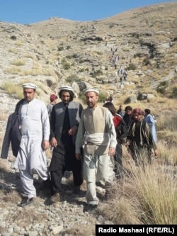 Nadeem Askar (C) and Haji Abdul Samad (L) led a group of volunteers to broker a cease-fire between Khaddi and Machi Khel clans on November 19.