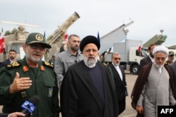 Iranian President Ebrahim Raisi (center) visits the Iranian Revolutionary Guards Corps navy base in Bandar Abbas, southern Iran, on February 2.