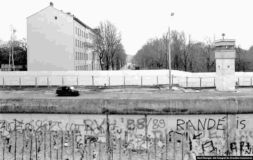 A car patrolling the &quot;death strip&quot; along Bernauer Street in 1989