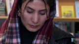 GERMANY / Sara Seerat, an Afghan in Germany, Munich, in the library, ahead of the elections