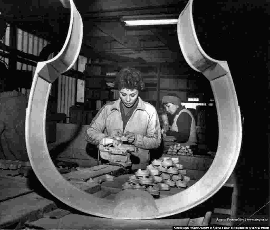 Workers inside a musical instrument factory in Reghin, Transylvania, in 1980 &nbsp;&ldquo;I contacted them and they were glad,&rdquo; Szocs recalled of the thousands of images he discovered in the rural library. &ldquo;They said, &lsquo;Oh, wow, you&rsquo;re interested in those?&#39; Because they&rsquo;d just been sitting there for years.&rdquo; &nbsp;