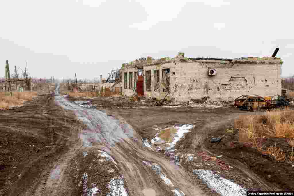 The ruins of a roadside business seen on December 4.&nbsp; Grom says during her many trips to photograph the city, she became close with some of the residents whom she describes as &quot;tenderhearted, kind people who faced severe trials.&quot;&nbsp;