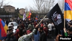 Anti-LGBT activists demonstrating outside the parliament building in Yerevan in April.