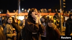 Belgrade University students participate in a 24-hour blockade of a major junction during a protest in the Serbian capital on January 27.