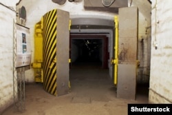 A steel blast door in the base designed to withstand a nuclear explosion and the surge of seawater that would follow such a strike