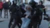 Russian Lawyer Offers Reward For Identifying Officer Who Punched Female Protester