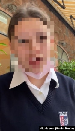 A screenshot from Lida Slutskaya's TikTok account, where she appears in the uniform of TASIS The American School In Switzerland.