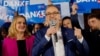 Freedom Party leader Herbert Kickl talks to supporters in Vienna late on September 29, as vote projections showed his party winning Austria's general election.