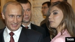 Vladimir Putin and gymnast Alina Kabayeva (ITAR-TASS)