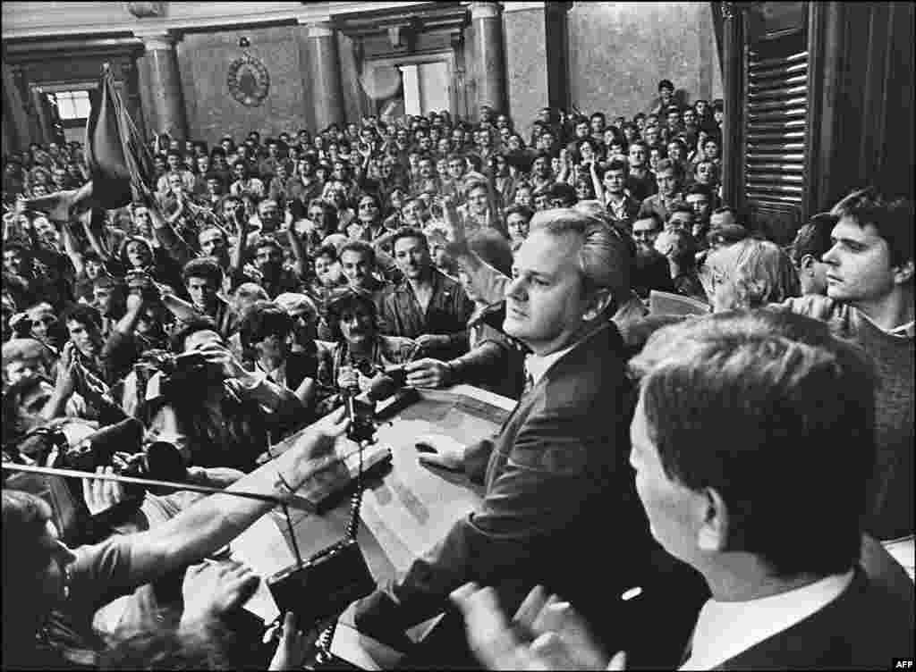 Serbian communist leader Slobodan Milosevic addresses workers inside Belgrade&rsquo;s parliament in 1988. In 1987, with ethnic tensions heating up amid economic turmoil, Milosevic openly sided with nationalist Serbs in Kosovo complaining of persecution by the majority ethnic Albanians. Many saw Milosevic&rsquo;s decision to bring historical ethnic grievances into Yugoslav politics as the breaking of a taboo. Kosovo was a dangerously sensitive region partly due to its history of interethnic clashes. It was the beginning of the end for Yugoslavia. &nbsp;