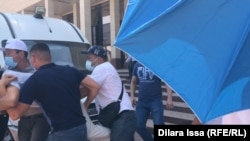 Police detained more than a dozen activists in Shymkent on July 1.