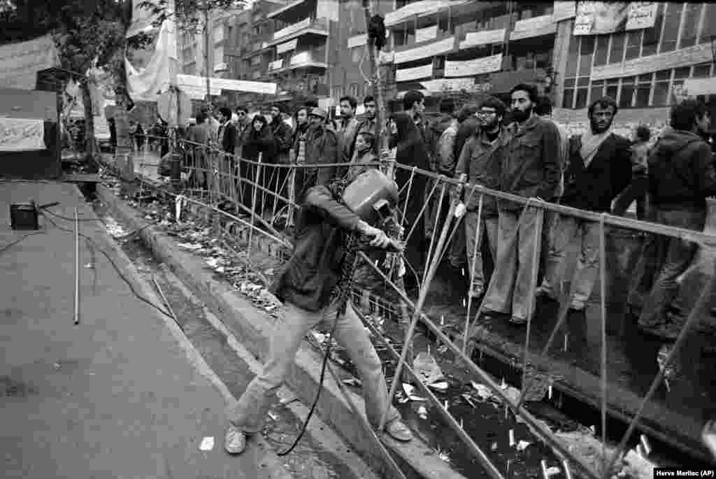 To hold back the growing crowds of anti-American demonstrators, a steel fence was erected around the embassy gates as Iranians marched to mark the holy day of Tasua on November 29, 1979.