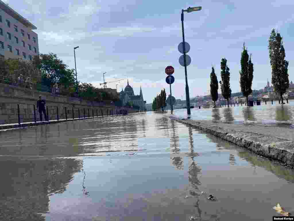 Floodwaters enugulf the quay along the Danube with the parliament building in the background. Budapest Mayor Gergely Karacsony announced that the city will use 1 million sandbags to fortify flood defenses.