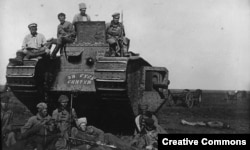 Bolshevik fighters are seen here with a White tank, named For Holy Rus, reportedly captured in the counteroffensive toward Crimea in October 1920. British Mark V tanks contributed to some significant White successes during the civil war, such as the 1919 capture of Tsaritsyn, which later became Stalingrad and then Volgograd.