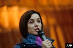 Moldovan pro-EU politician and presidential candidate Maia Sandu addressing supporters on October 24.