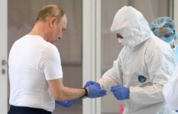 Russian President Vladimir Putin visits a "showcase" hospital on the outskirts of Moscow in March.