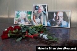 A memorial at the Central House of Journalists in Moscow to the three Russians killed in the CAR.