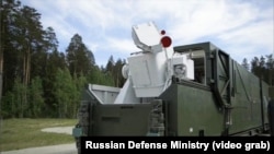 A still image from a Russian Defense Ministry video shows what appears to be a truck-mounted laser weapon known as the Peresvet.