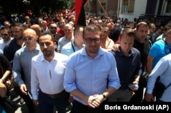 VMRO-DPMNE leader Hristijan Mickoski (center) at a protest against the deal between Greece and Macedonia in the southern town of Bitola in June