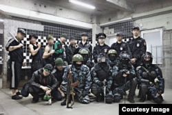 A group of Japanese cosplayers dressed as Russian police and gangsters.