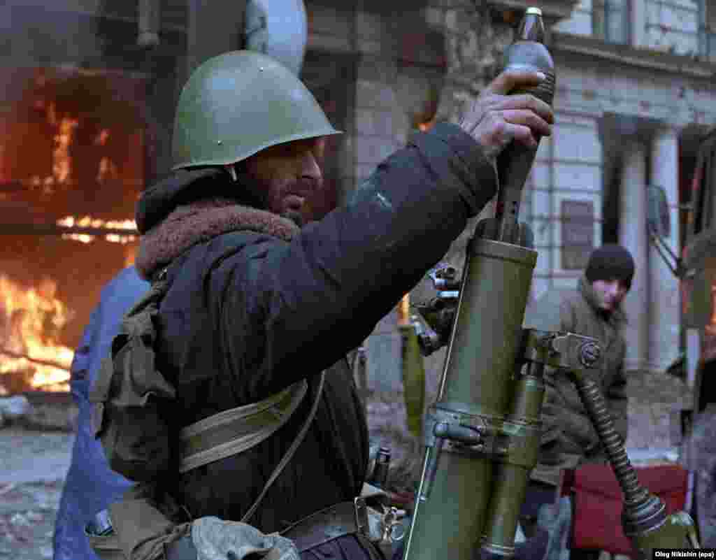 An anti-government fighter loads a mortar on Rustaveli Avenue during the Tbilisi War. In December 1991 amid the breakup of the U.S.S.R., Rustaveli became a literal war zone as anti-government fighters deployed mortars, tanks, and heavy artillery on Rustaveli Avenue in an attempt to storm the parliament.