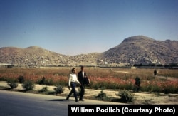 Young boys walk home on the outskirts of Kabul.