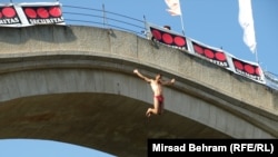 Tanasijevic's cyclists usually join locals for the traditional annual plunge from Mostar's iconic 16th-century Stari Most bridge.