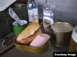 A lunch that was served in a Soviet-style mess kit.