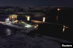 The PD-50 dry dock lies partially submerged following the October 30 incident.