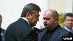 Mykola Zlochevskiy (right) together with former Ukrainian President Viktor Yanukovych in 2011.