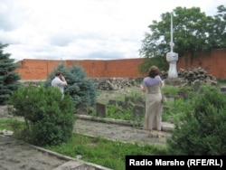 Natalya Estemirova visiting the memorial to victims of the 1944 Chechen deportation in Grozny (undated photo)