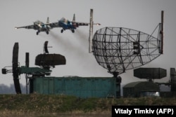 Russian Su-25 fighter planes takes part in combat training.