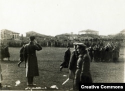 Wrangel (saluting) oversees a military parade in Gallipoli.