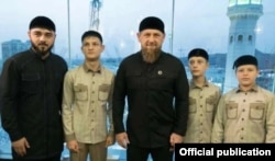 The Kremlin-appointed ruler of Chechnya, Ramzan Kadyrov (center), with his nephew Khamzat and sons Akhmat, Zelimkhan, and Adam (from left to right).