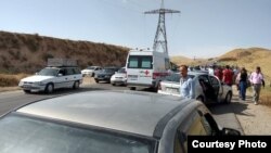 An ambulance arrives at the scene of the attack in south Tajikistan.