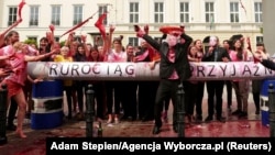 People protest against Hungarian energy policy and importing Russian oil via the Przyjazn pipeline in front of the Hungarian Embassy in Warsaw on June 4, 2022.