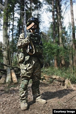 A Japanese cosplayer dressed as a Ukrainian soldier.