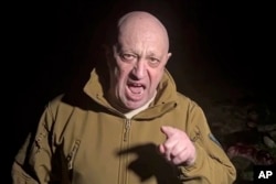 In a video released on May 5, Yevgeny Prigozhin stands in front of multiple bodies lying on the ground that he said were dead Wagner fighters and berates the Kremlin for lack of support.