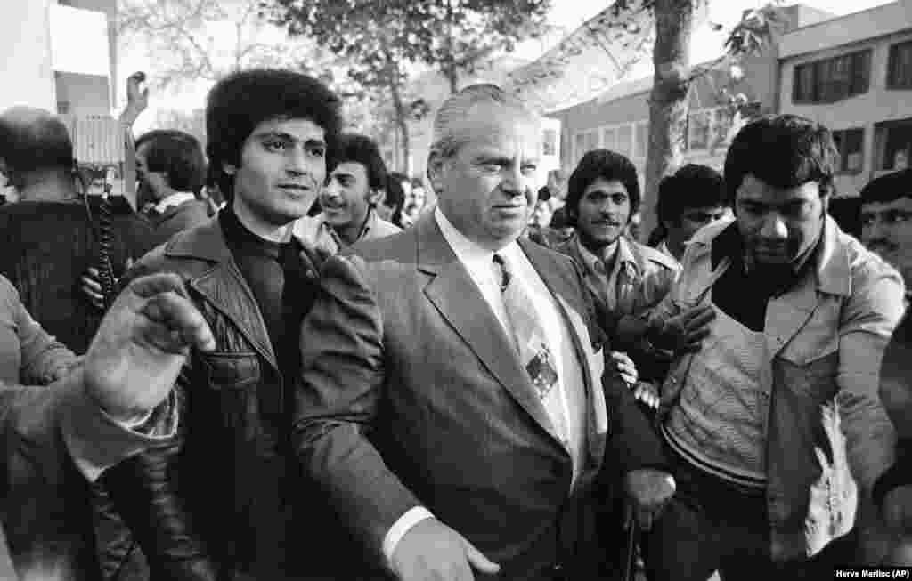 Efforts by the International Red Cross to check on the hostages were thwarted. The organization&rsquo;s delegate, Andre Tschiffeli (center), was only allowed a two-hour meeting with the student captors on November 24, 1979. He was given no access to the hostages. United Nations representatives were also kept away.