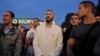 Maksimovic, wearing his trademark white suit, at a September 2016 protest against a controversial development project in Belgrade.