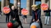 Two activists dressed up as U.S. President Trump and Russian President Putin ride two atomic bomb models during a protest in Berlin for a world without nuclear weapons. (file photo)