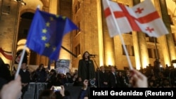 Georgian President Salome Zurabishvili addresses protesters outside the Georgian parliament after disputed elections on October 28. 