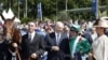 A horse-racing enthusiast, the Aga Khan (second from left) is spiritual leader to millions of Ismaili Muslims.