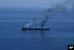 Fires burn aboard the oil tanker Sounion in the Red Sea after it was struck by the Huthis on August 25.