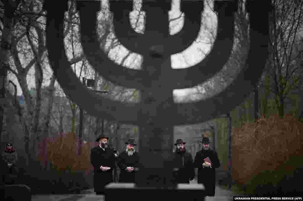 Participants take part in a memorial ceremony to honor the victims of the Holocaust at Babyn Yar in Ukraine on January 27.&nbsp;