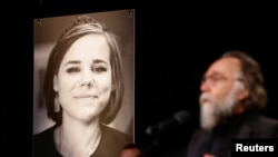 Russian far-right ideologue Aleksandr Dugin speaks at a memorial service in Moscow for his daughter Darya Dugina on August 23. 