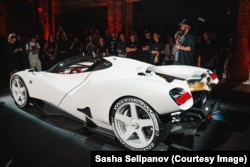 Sasha Selipanov (right) unveils the Nilu27 hypercar.